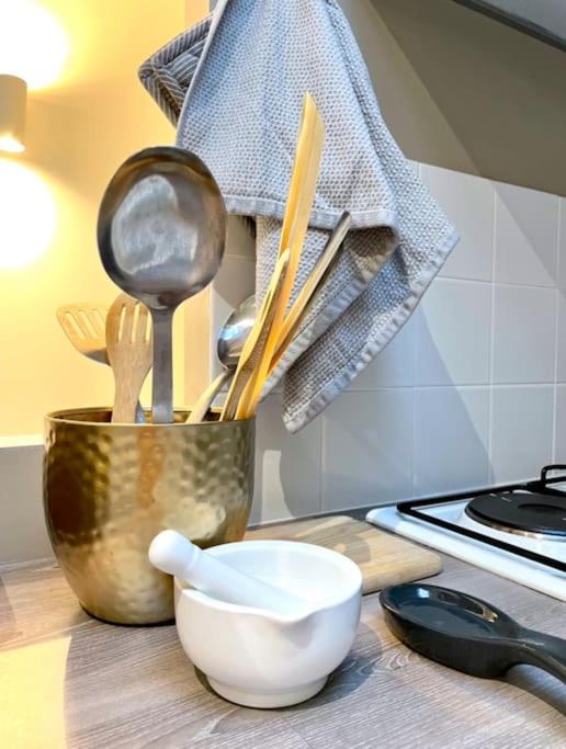Kuchyň nebo kuchyňský kout v ubytování Cosy Camon Bolt-Hole