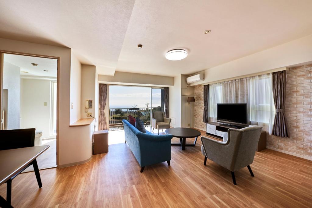 TV a/nebo společenská místnost v ubytování Hotel Village Izukogen