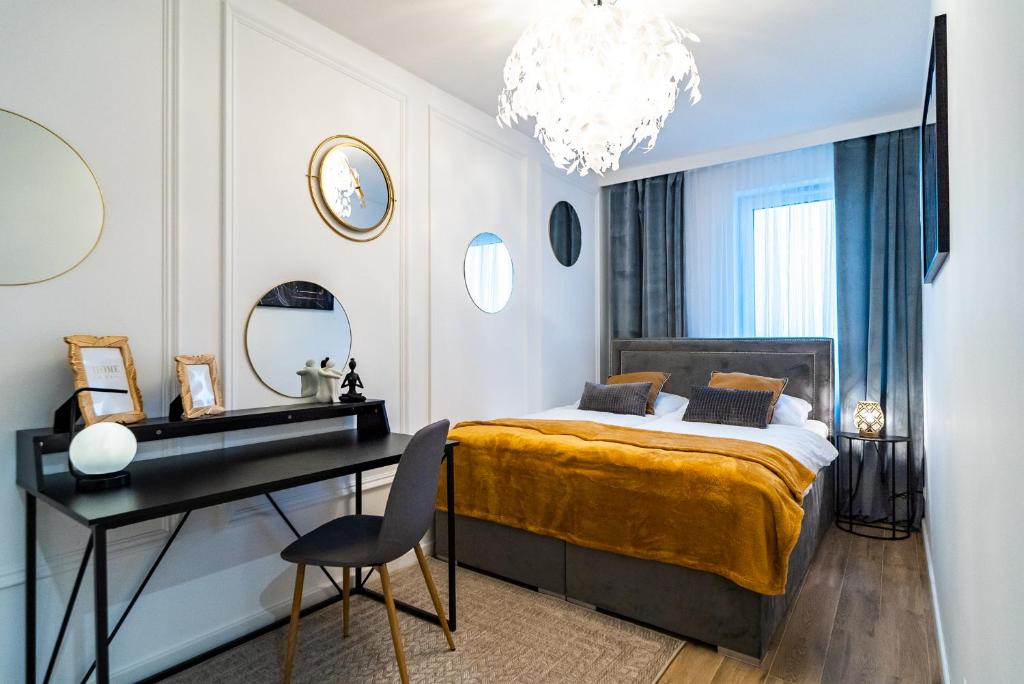 Posteľ alebo postele v izbe v ubytovaní ApartamentySnu, Struga Tower Double Gold z parkingiem
