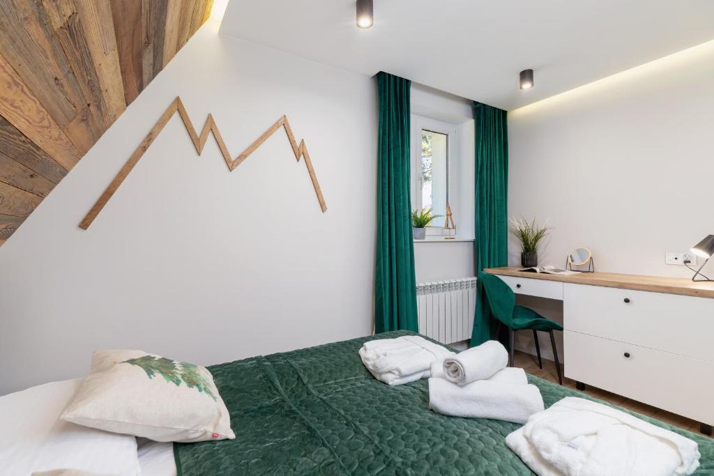 Posteľ alebo postele v izbe v ubytovaní Apartament Salamandra Giewont View by Renters Prestige