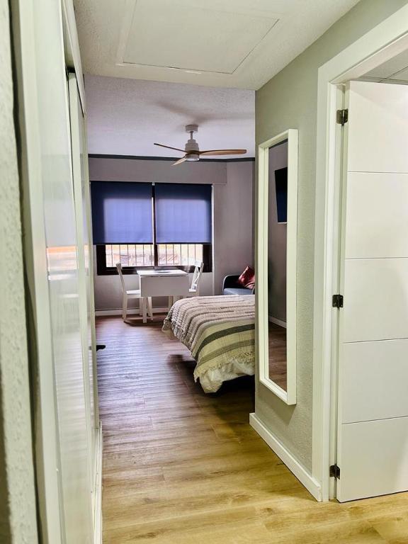 A bed or beds in a room at Home Triana