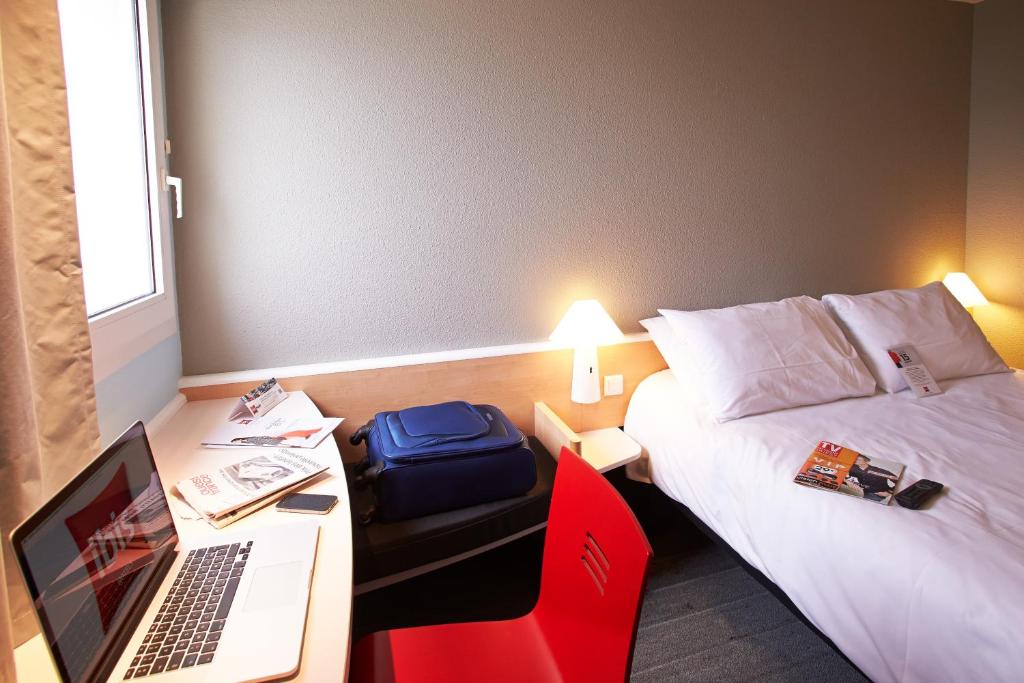 Postel nebo postele na pokoji v ubytování Ibis Auray