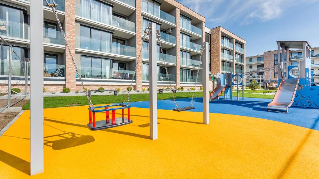 Detský kútik v ubytovaní Apartament Grey 10 C Perłowa Przystań - Holiday City