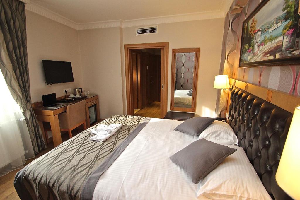 Postel nebo postele na pokoji v ubytování Levent Hotel Istanbul