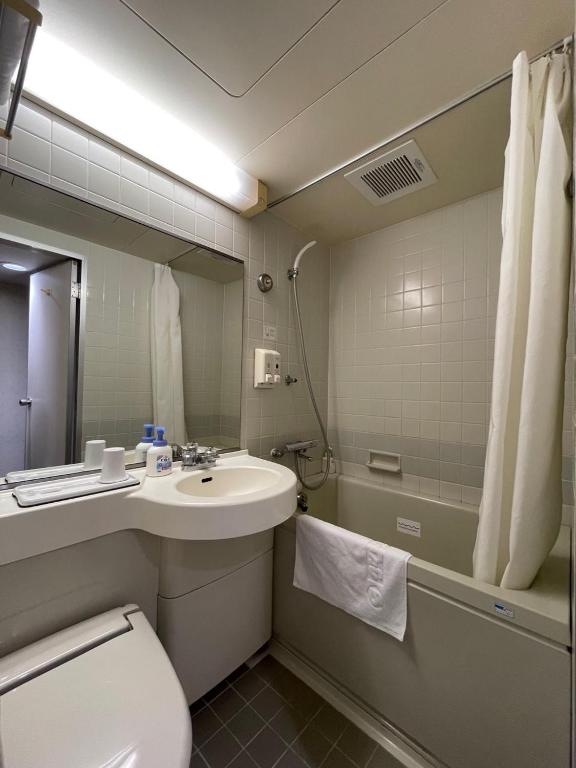 Koupelna v ubytování EN HOTEL Ise