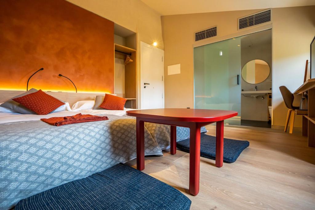 Postel nebo postele na pokoji v ubytování Hotel japonès Puigpinós