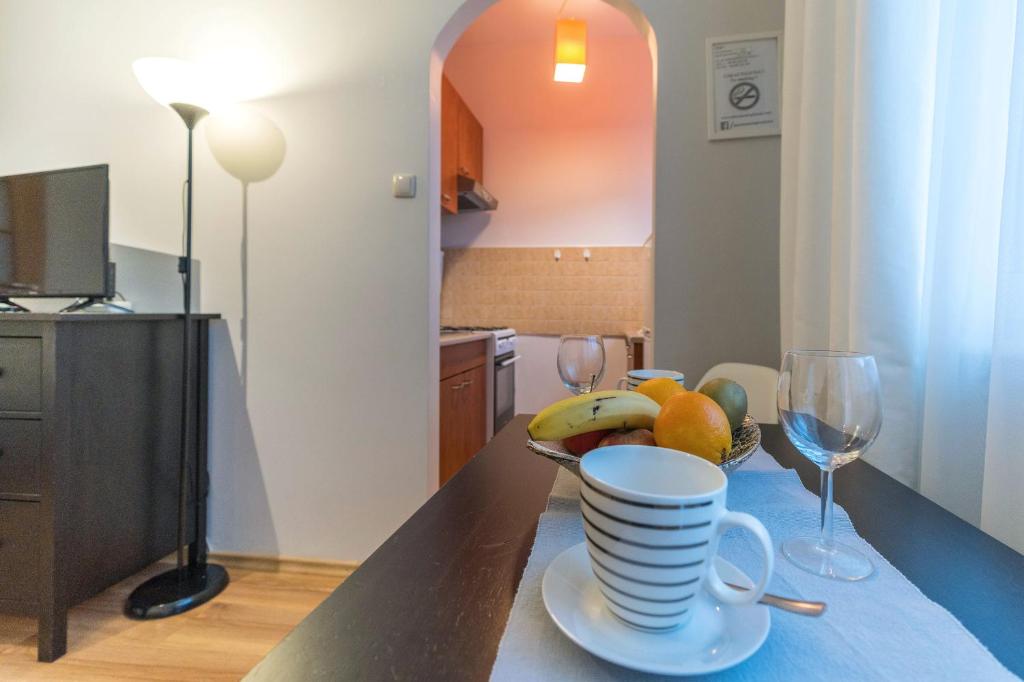 Televízia a/alebo spoločenská miestnosť v ubytovaní Apartamenty Przytulne z balkonem, 150m od dworca Gdańsk Główny