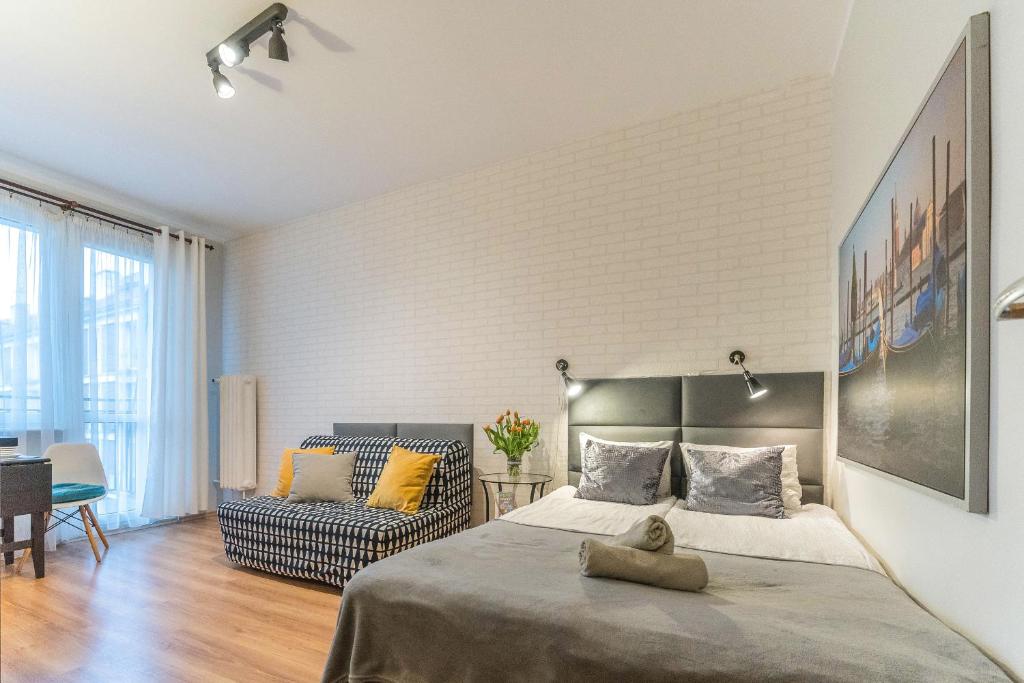 Posedenie v ubytovaní Apartamenty Przytulne z balkonem, 150m od dworca Gdańsk Główny