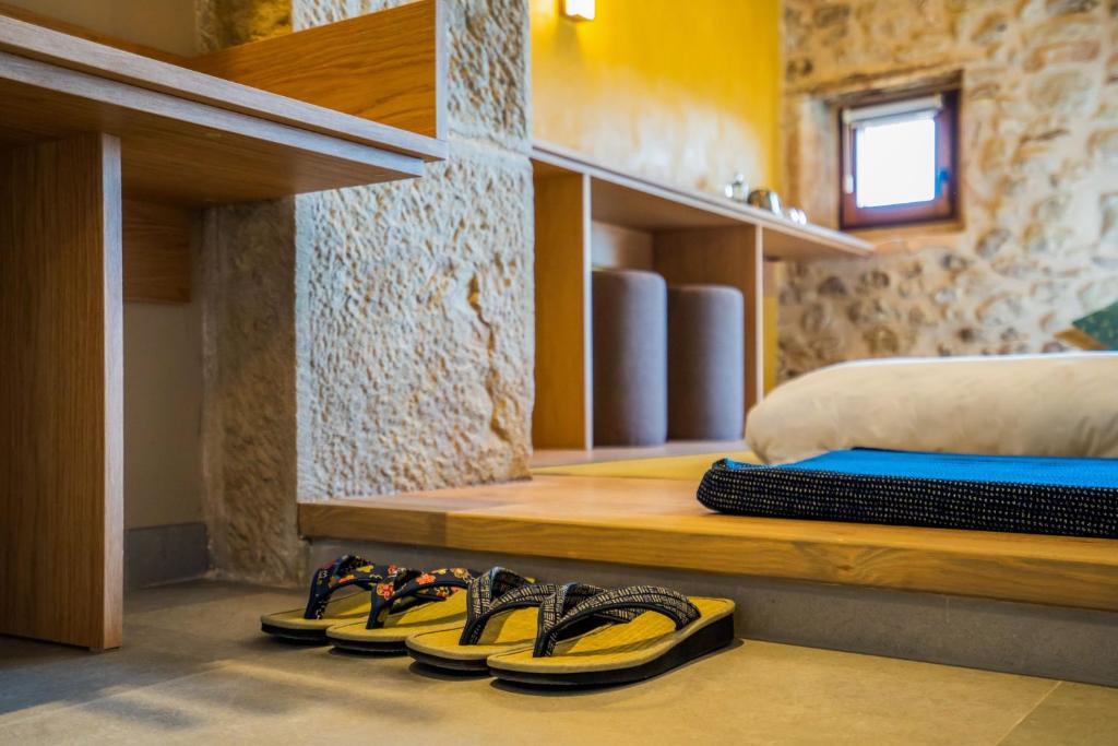 Postel nebo postele na pokoji v ubytování Hotel japonès Puigpinós