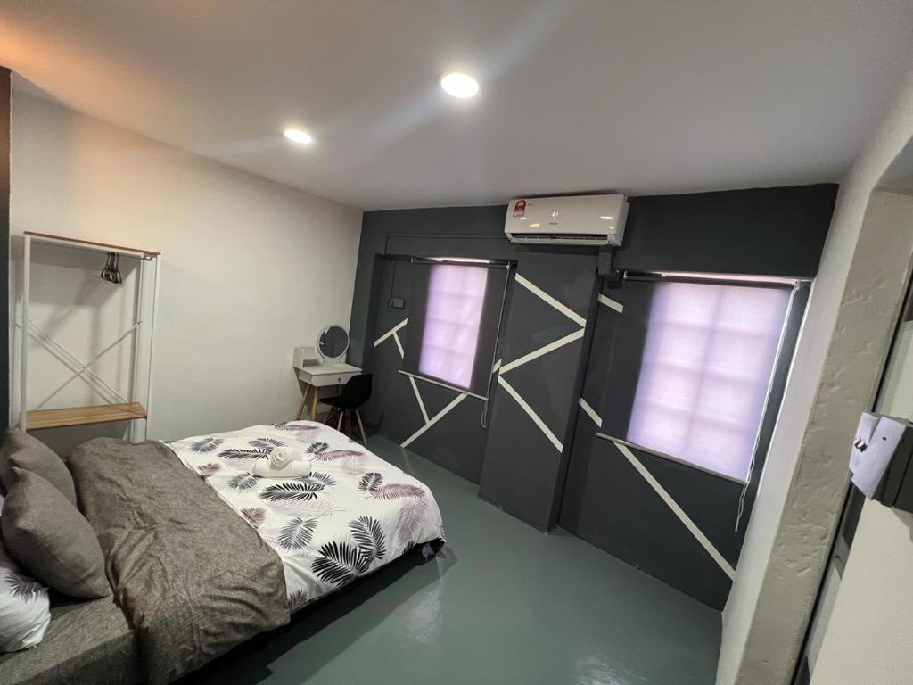 Postel nebo postele na pokoji v ubytování GD HOMESTAY