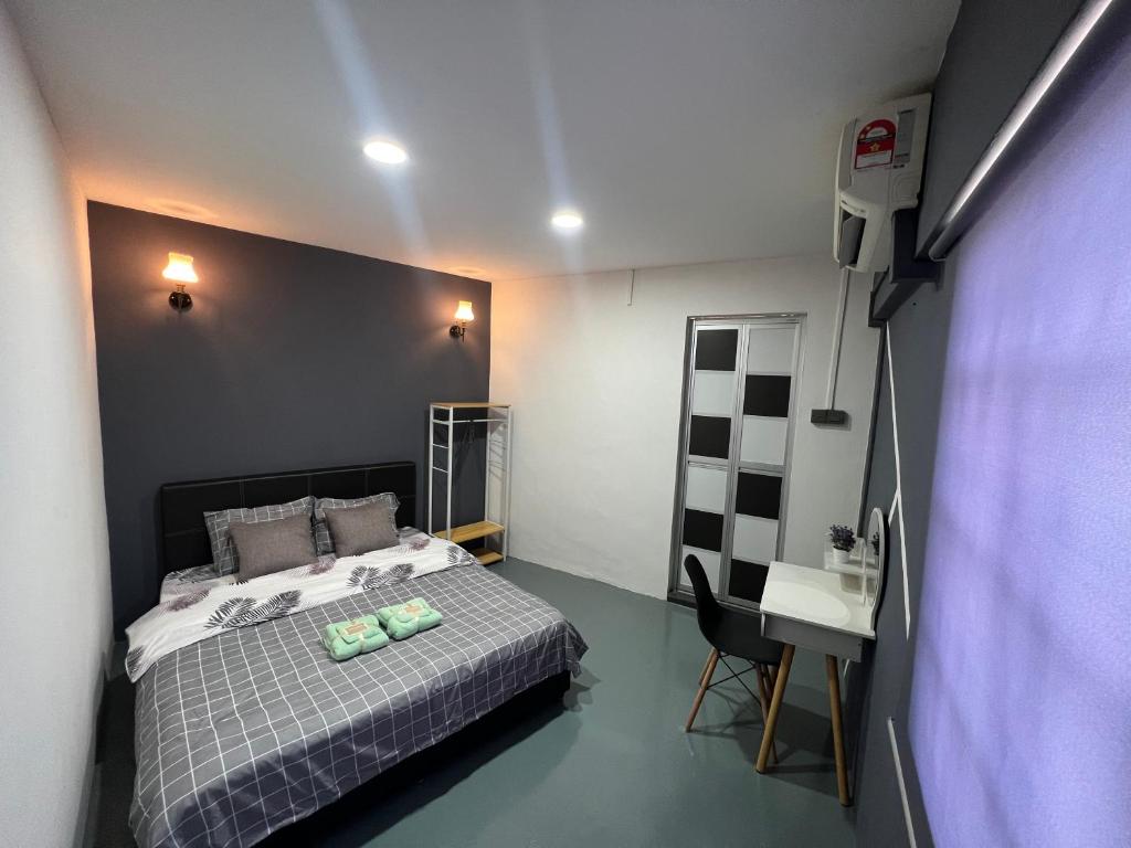 Postel nebo postele na pokoji v ubytování GD HOMESTAY