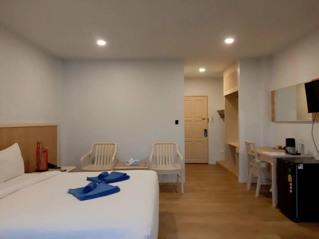 Postel nebo postele na pokoji v ubytování Karon Living Room - SHA Plus