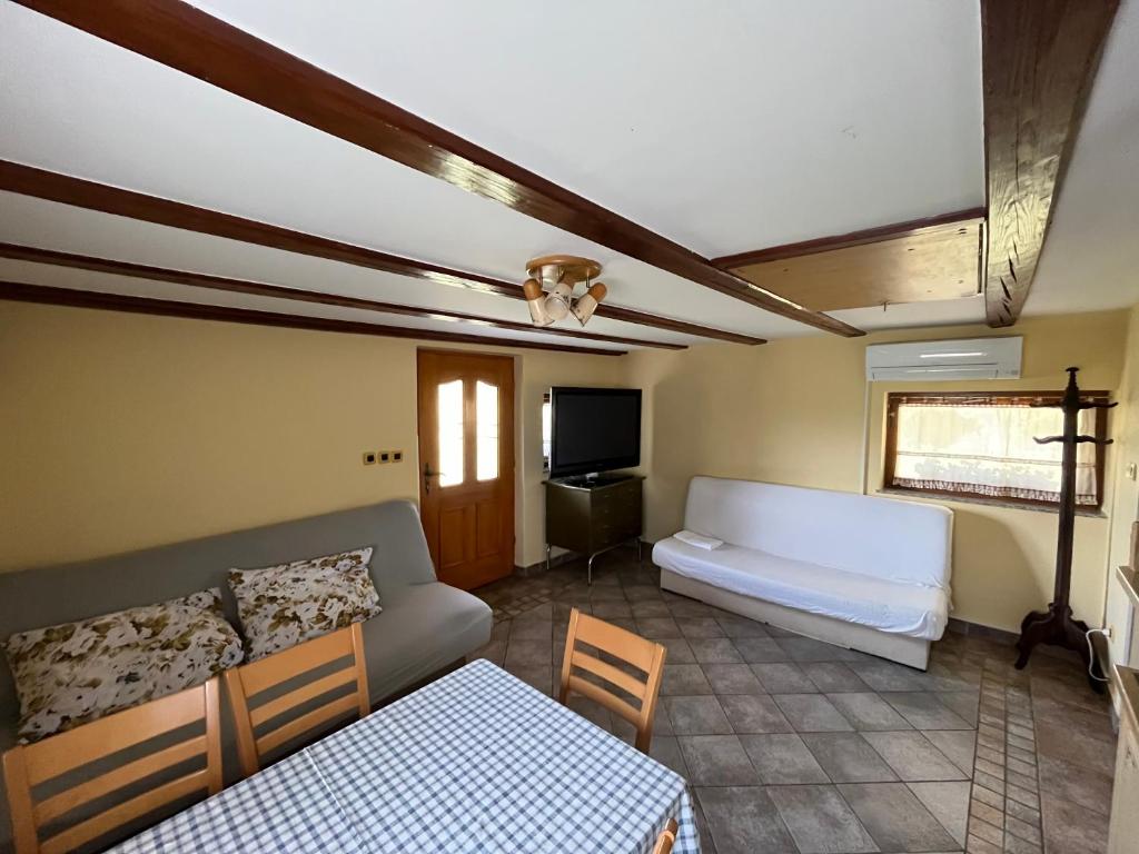Postel nebo postele na pokoji v ubytování Holiday Home Dobrotin