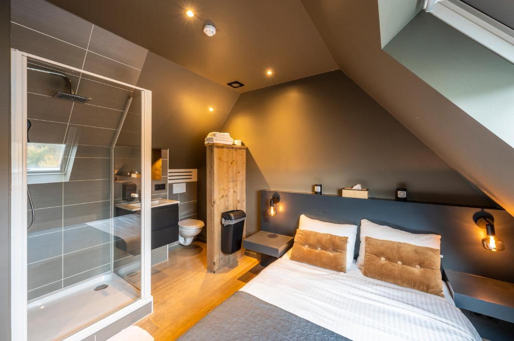 Postel nebo postele na pokoji v ubytování M-otel E40