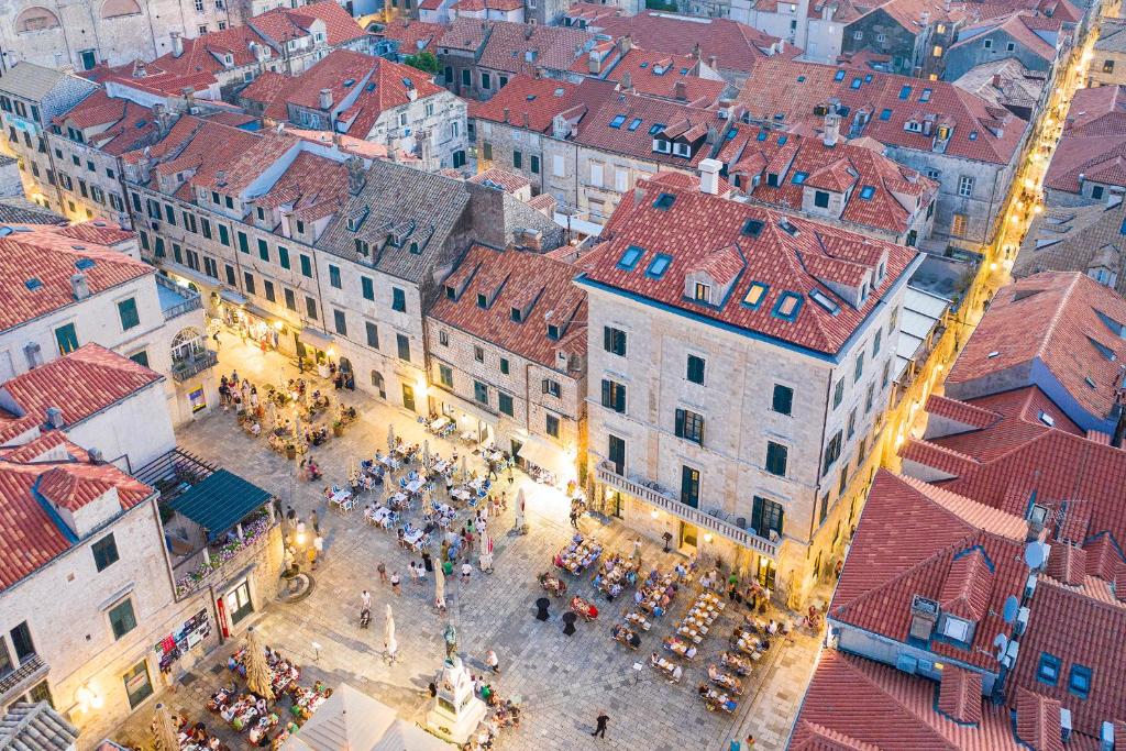 an overhead view of a city with a crowd of people at The Pucic Palace in Dubrovnik