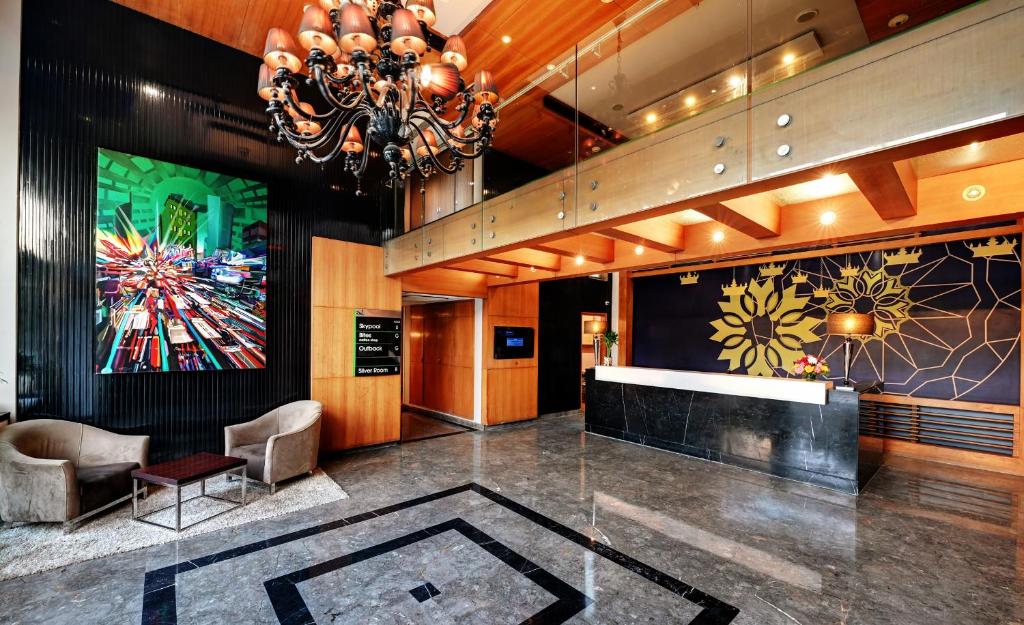 TV a/nebo společenská místnost v ubytování Quality Inn Gurgaon