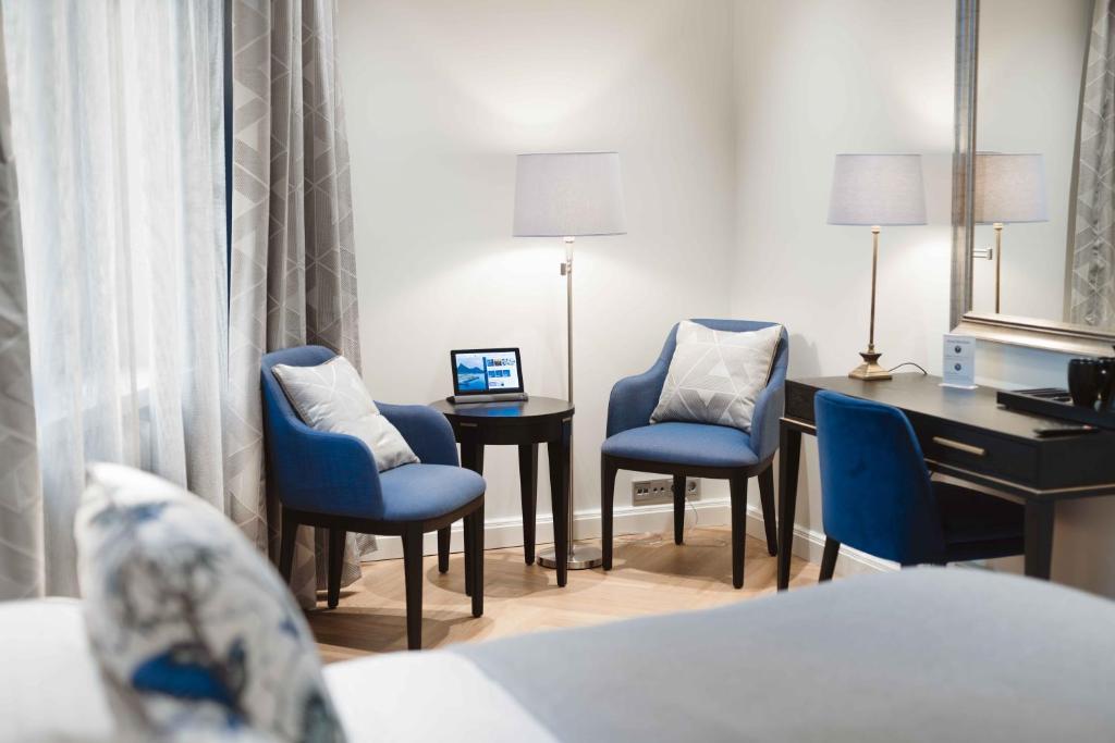 Postel nebo postele na pokoji v ubytování Hotel Bastian