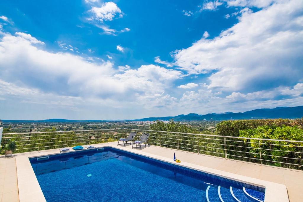 a swimming pool on the roof of a house at Ideal Property Mallorca - Es Claperas in Inca
