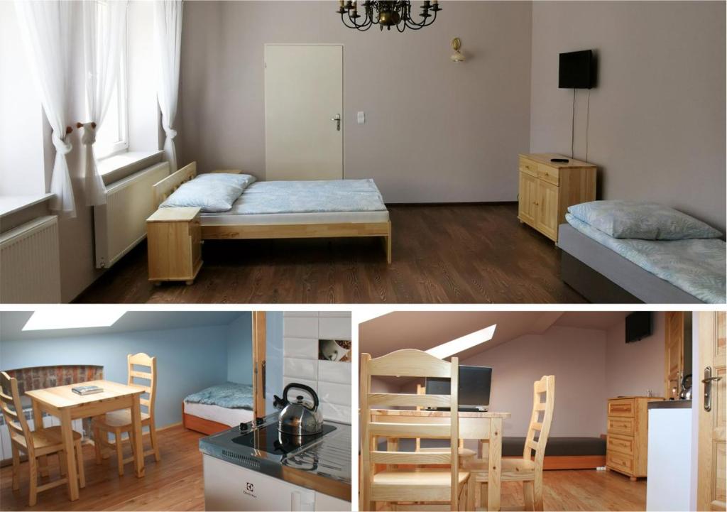 um quarto com uma cama e um quarto com uma mesa em Apartament Rodzinny em Nowy Targ