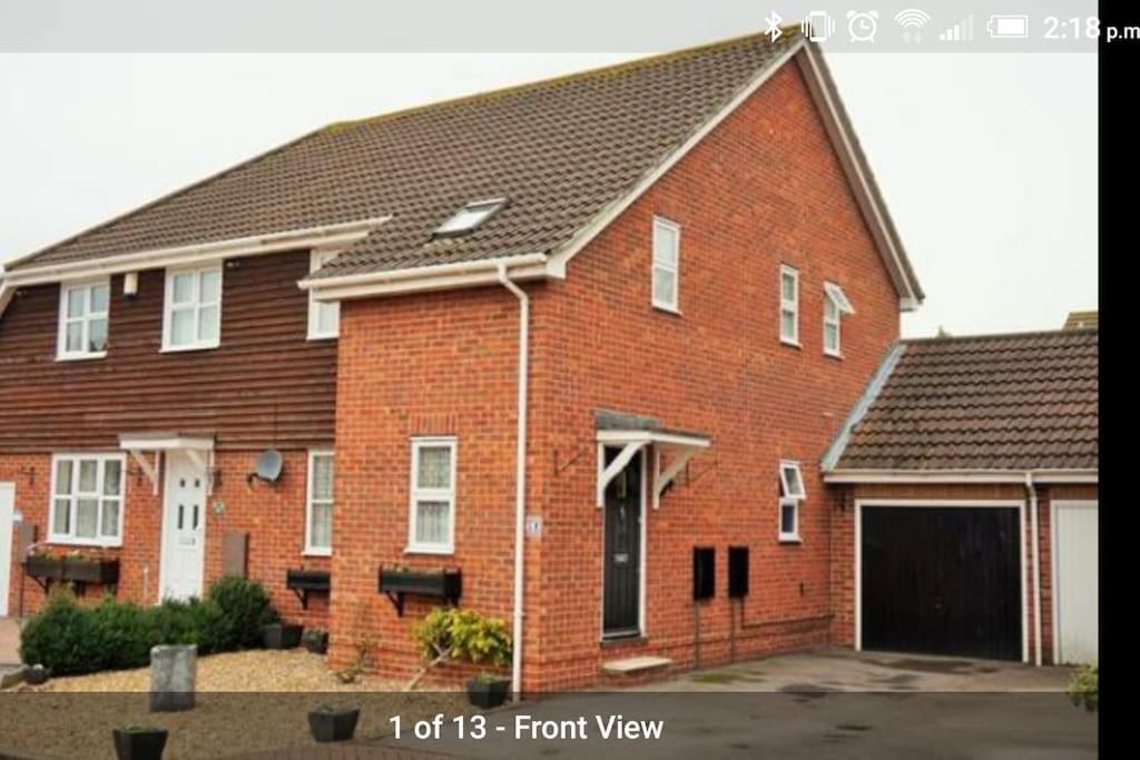 a large red brick house with a garage at Ideally located contemporary 3 bed spacious house in Wainscot