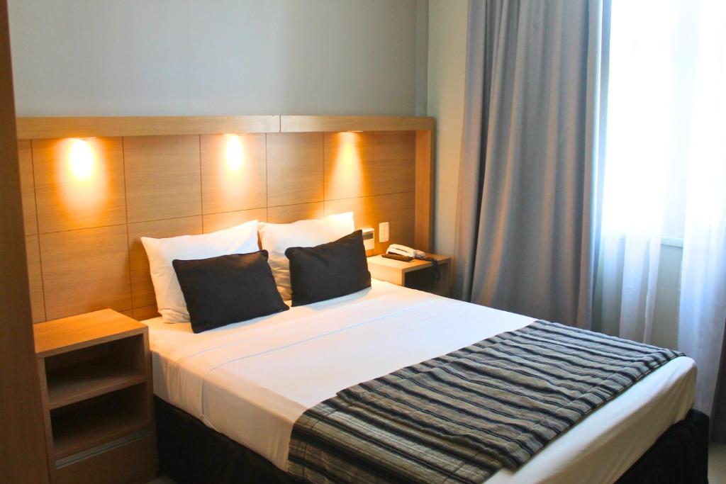 Postel nebo postele na pokoji v ubytování Hotel Atlântico Tower