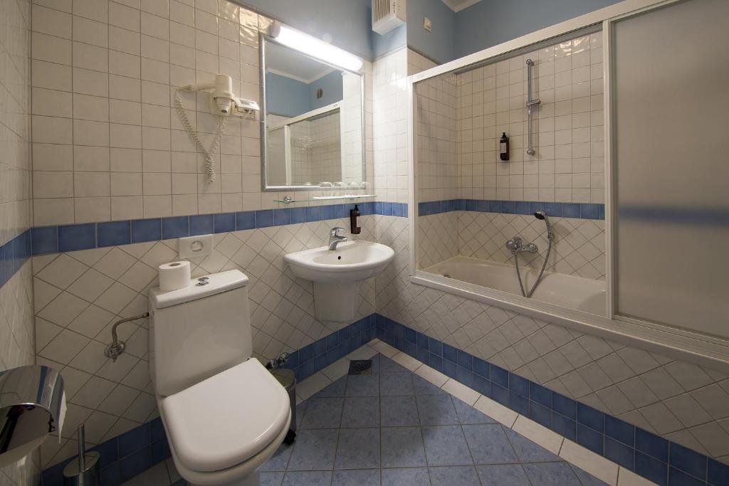 Koupelna v ubytování Hotel Kozana