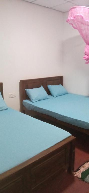 Postel nebo postele na pokoji v ubytování Impress Holiday Home