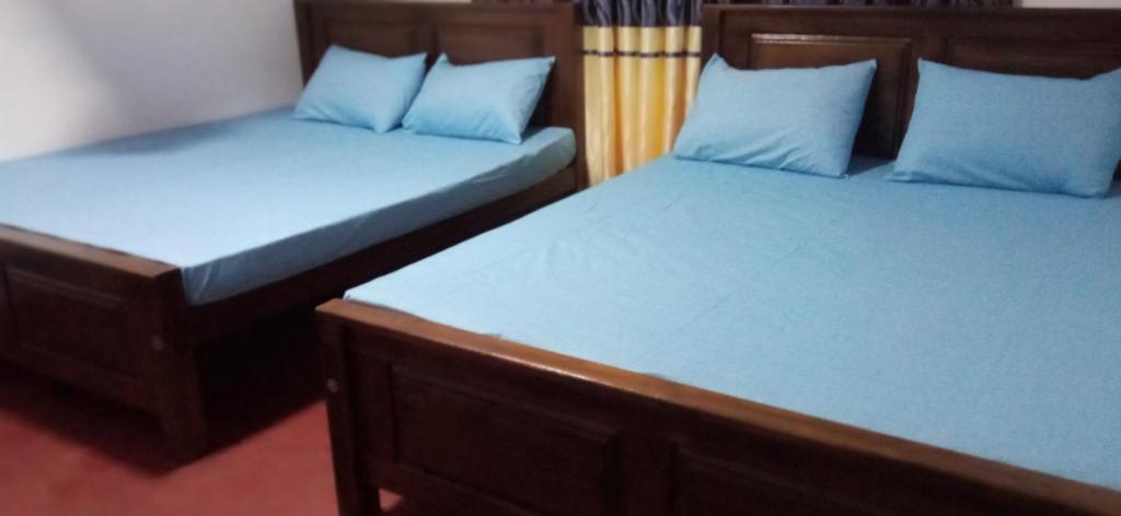 Postel nebo postele na pokoji v ubytování Impress Holiday Home