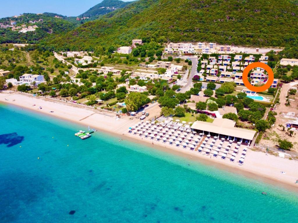 an aerial view of a beach with a resort at Villa Barbati Pelagos with private pool by DadoVillas in Barbati