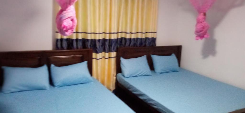 Postel nebo postele na pokoji v ubytování Impress Holiday Home