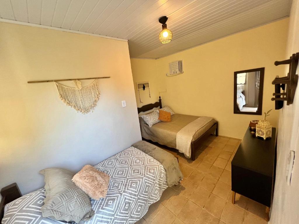 Postel nebo postele na pokoji v ubytování Coco Suites