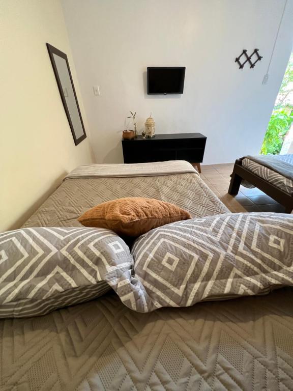 Postel nebo postele na pokoji v ubytování Coco Suites