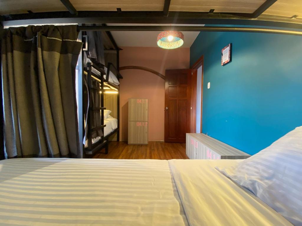 Postel nebo postele na pokoji v ubytování Bendito Hostels
