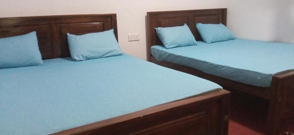 Postel nebo postele na pokoji v ubytování Impress Holiday Home