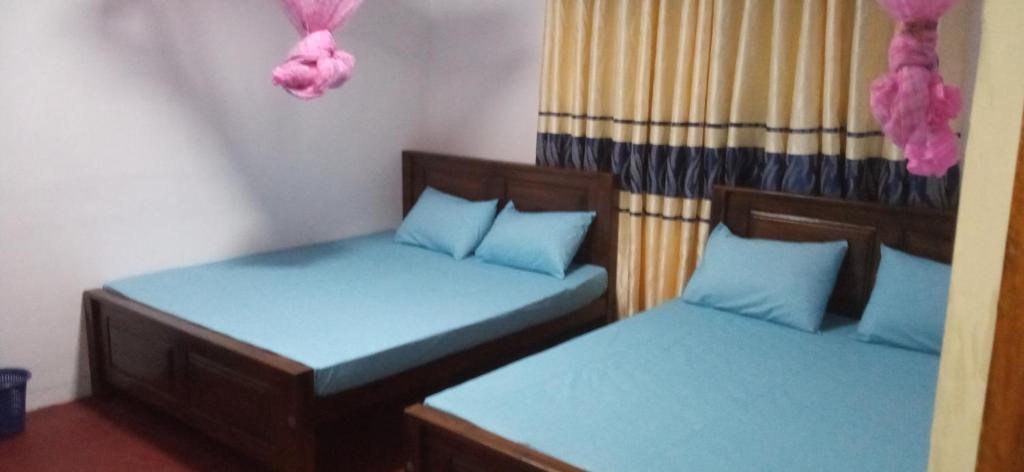 Postel nebo postele na pokoji v ubytování Impress Holiday Home