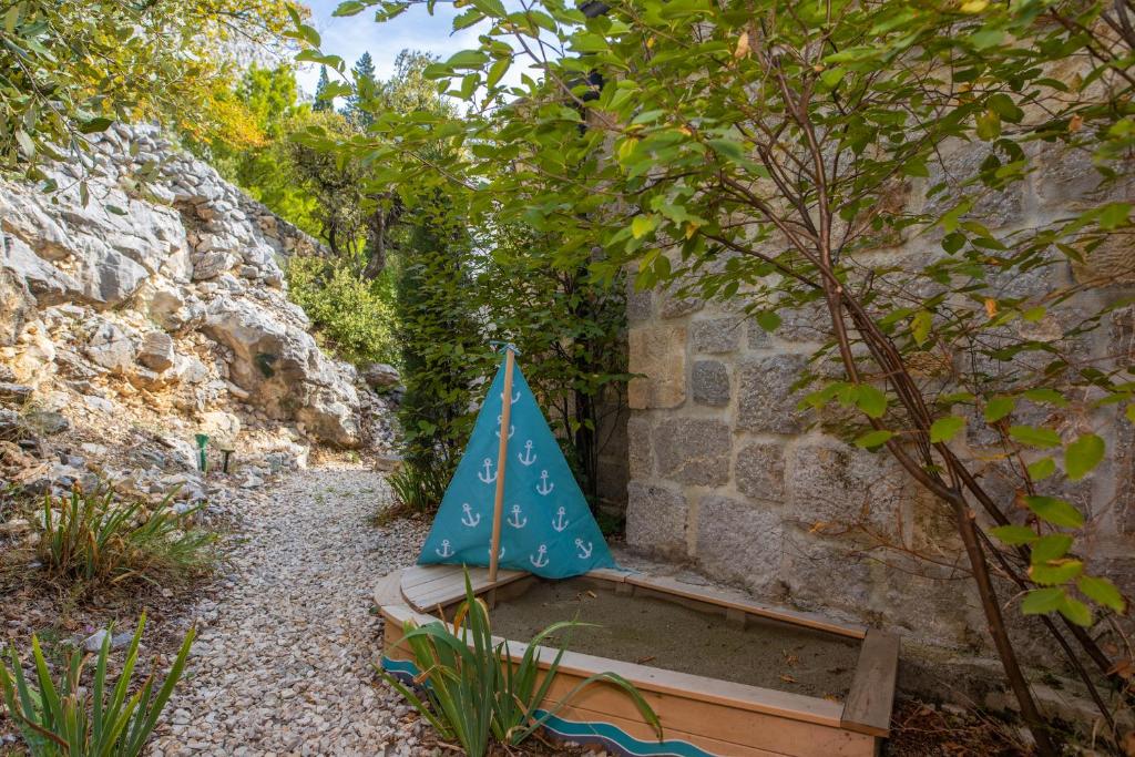 Vonkajšia záhrada v ubytovaní VILLA 2M