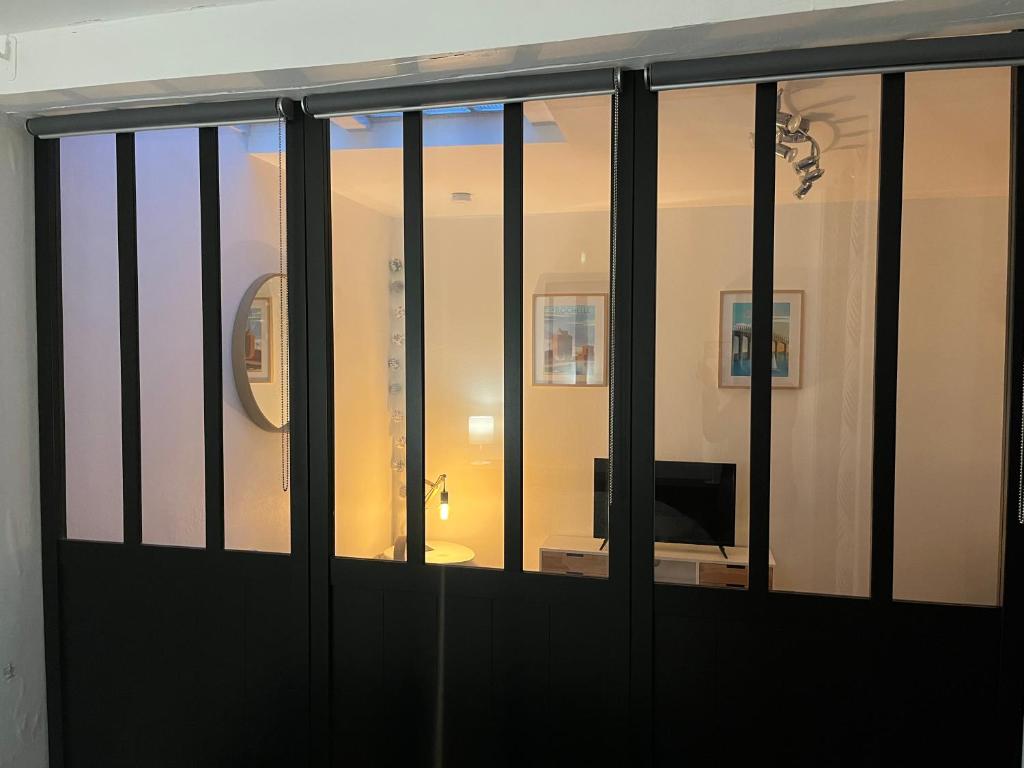 Logement cosy avec terrasse privée hypercentre - Appartement D'une Chambre