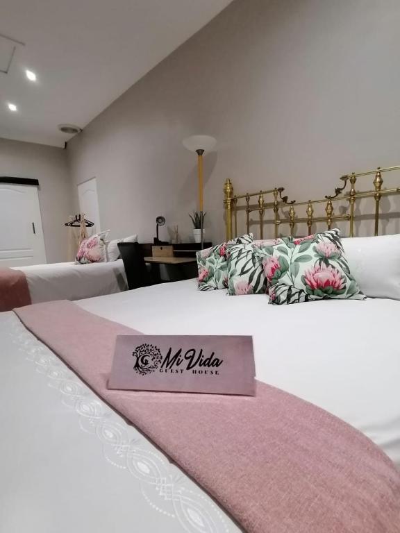Postel nebo postele na pokoji v ubytování Mi Vida Guesthouse