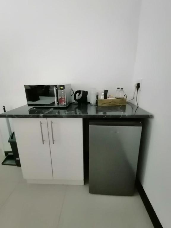Kuchyň nebo kuchyňský kout v ubytování Mi Vida Guesthouse