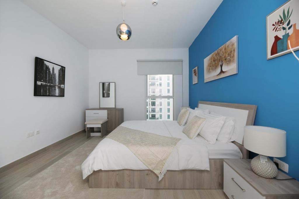 Posteľ alebo postele v izbe v ubytovaní Yas Island - 2 Bedrooms, 2 toilet with shared Pool & Parking