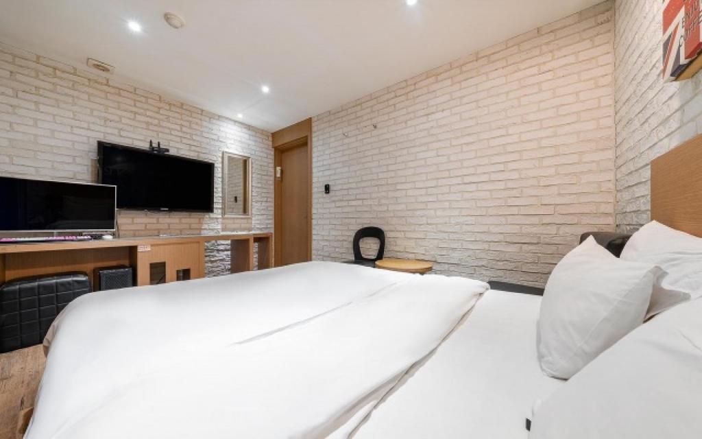 Postel nebo postele na pokoji v ubytování Laria Hotel