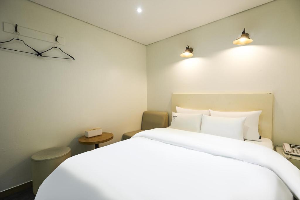 Postel nebo postele na pokoji v ubytování Laria Hotel