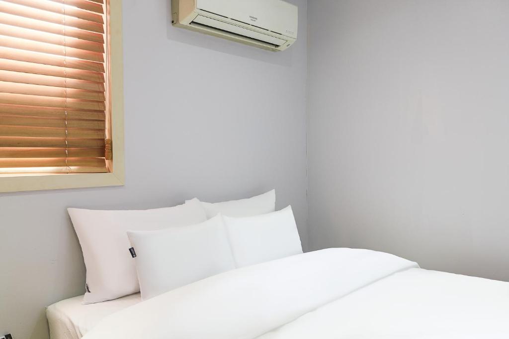 Postel nebo postele na pokoji v ubytování Laria Hotel