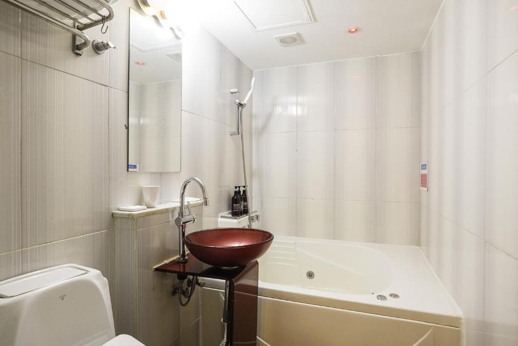 Koupelna v ubytování Laria Hotel