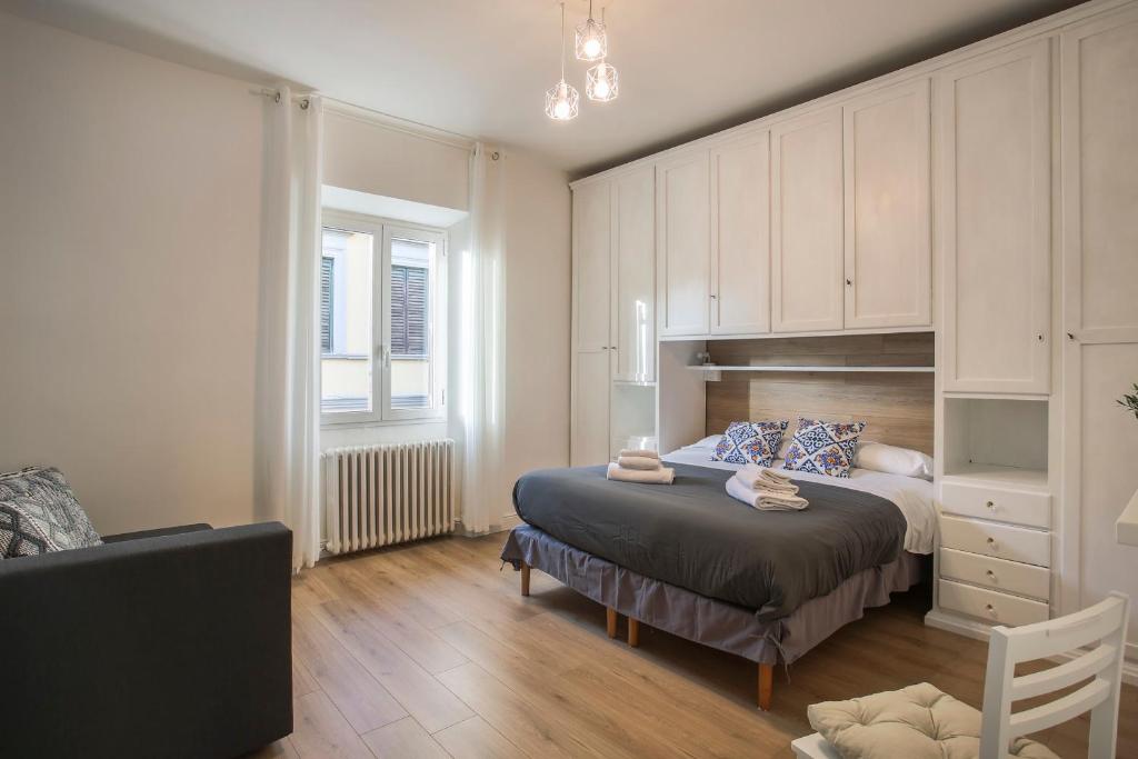 Łóżko lub łóżka w pokoju w obiekcie SANZANOBI Suite in Central Florence