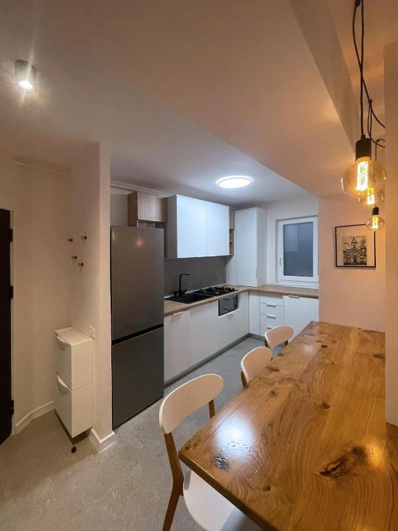 Kuchyň nebo kuchyňský kout v ubytování Apartament Mony