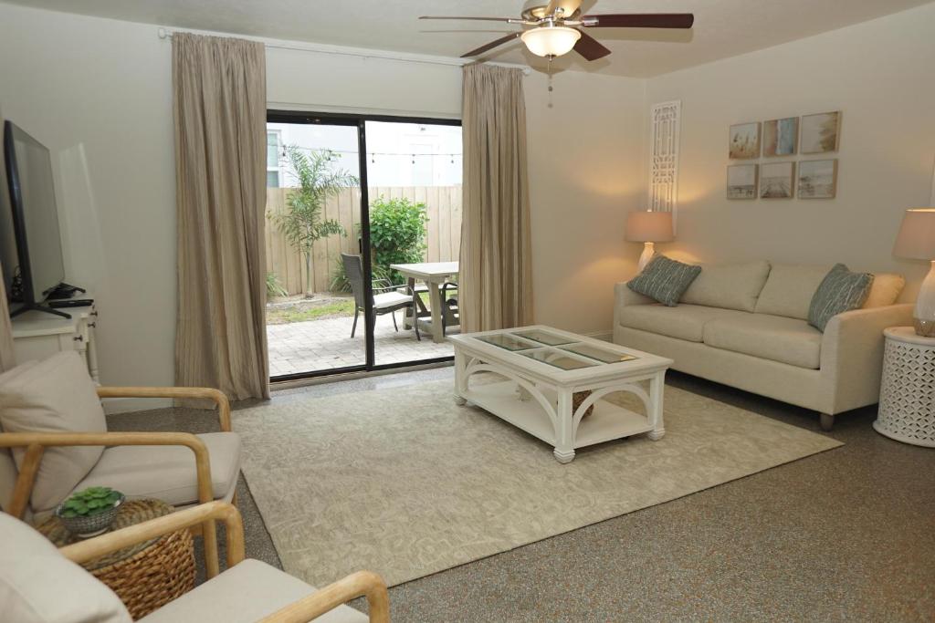 a living room with a couch and a table at NEW! 219 Garfield Ave in Cocoa Beach