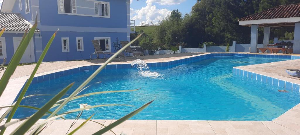 A piscina localizada em POUSADA BLUE GARDEN ou nos arredores