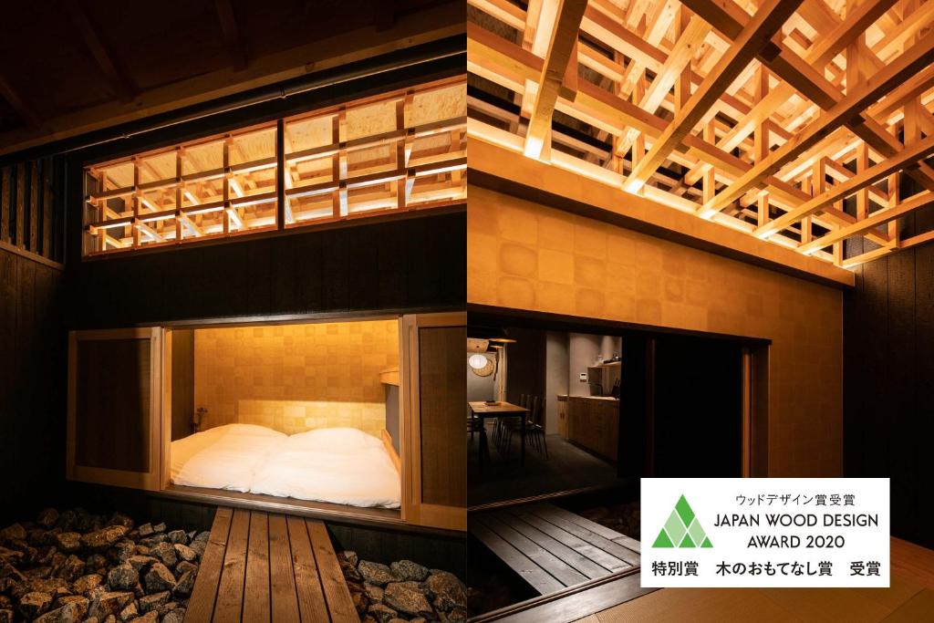 a room with a bed inside of a building at Contexted Boutique Villa in Osaka