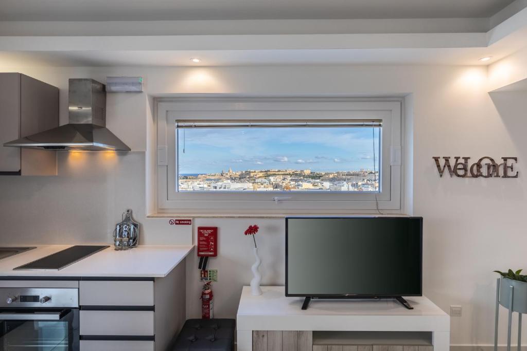 Kuchyň nebo kuchyňský kout v ubytování Terrace View - A Stylish Two Bedrooms Penthouse AC-WIFI